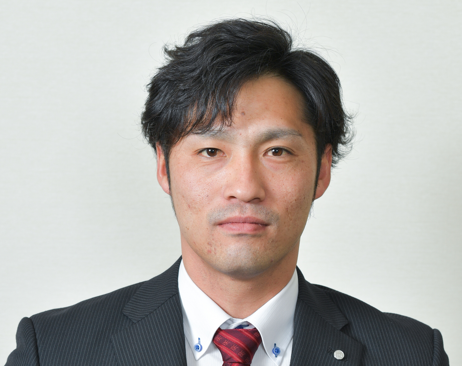 石塚 賢次